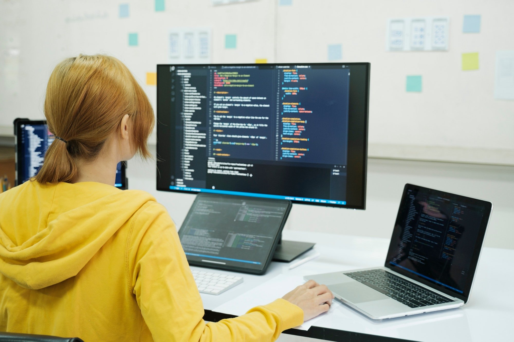 Programmer is coding and programming software.